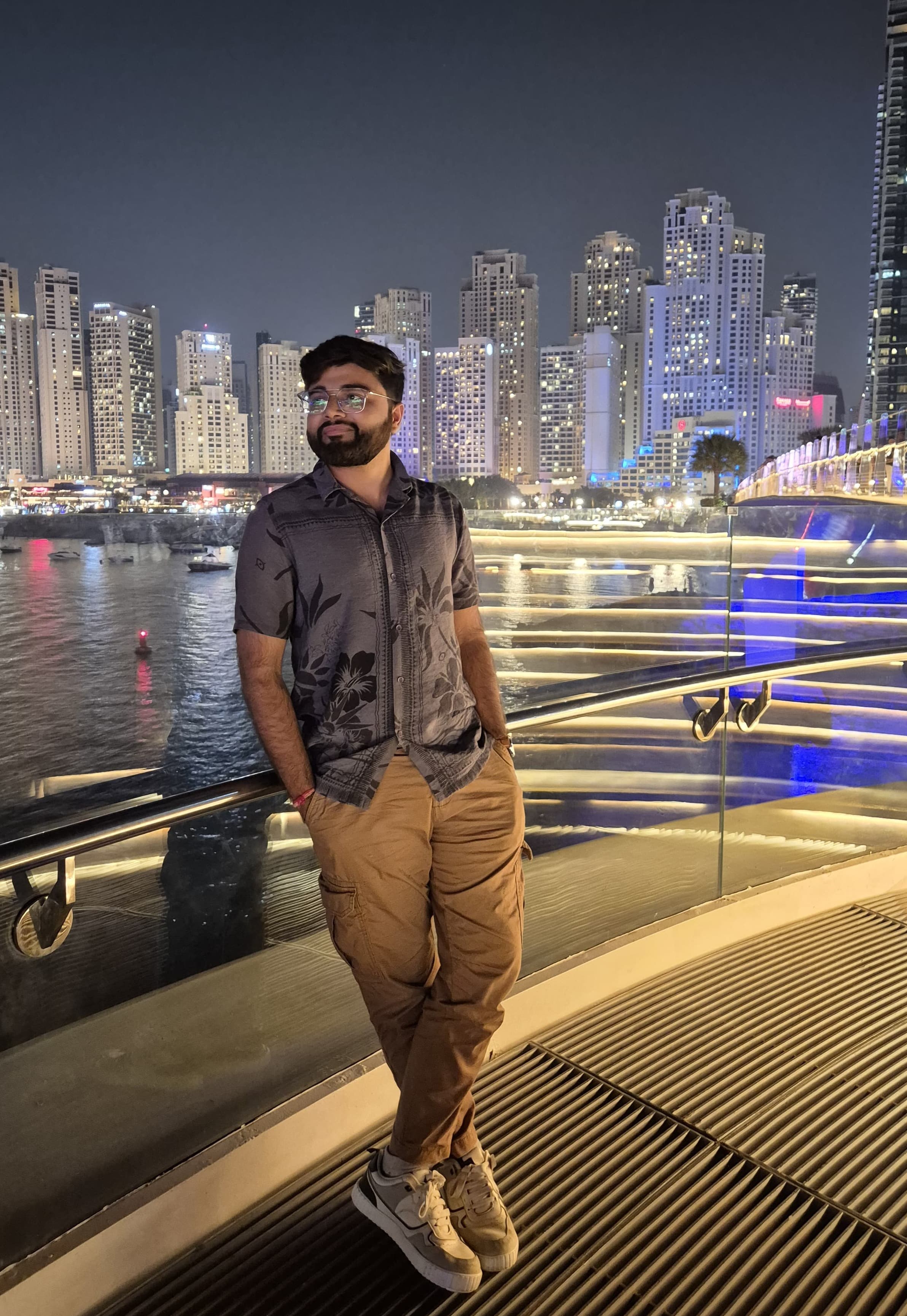 Dhruvin standing at Palm Jumeirah in Dubai